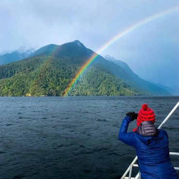 catching a rainbow in New Zealand at Doubtful Sound